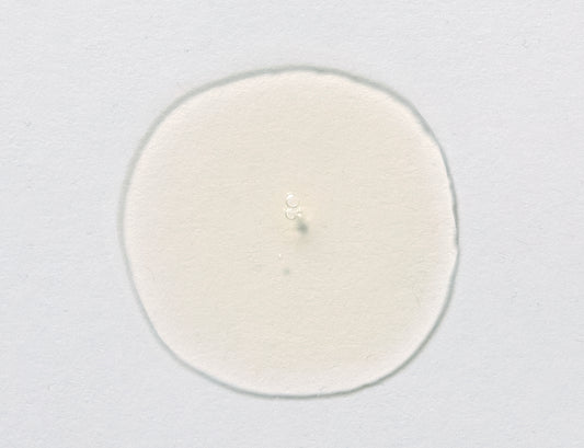 Puddle of product, Yellowish White.